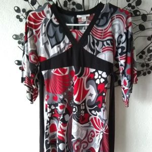Blouse by 'Ally B' in a size Medium.